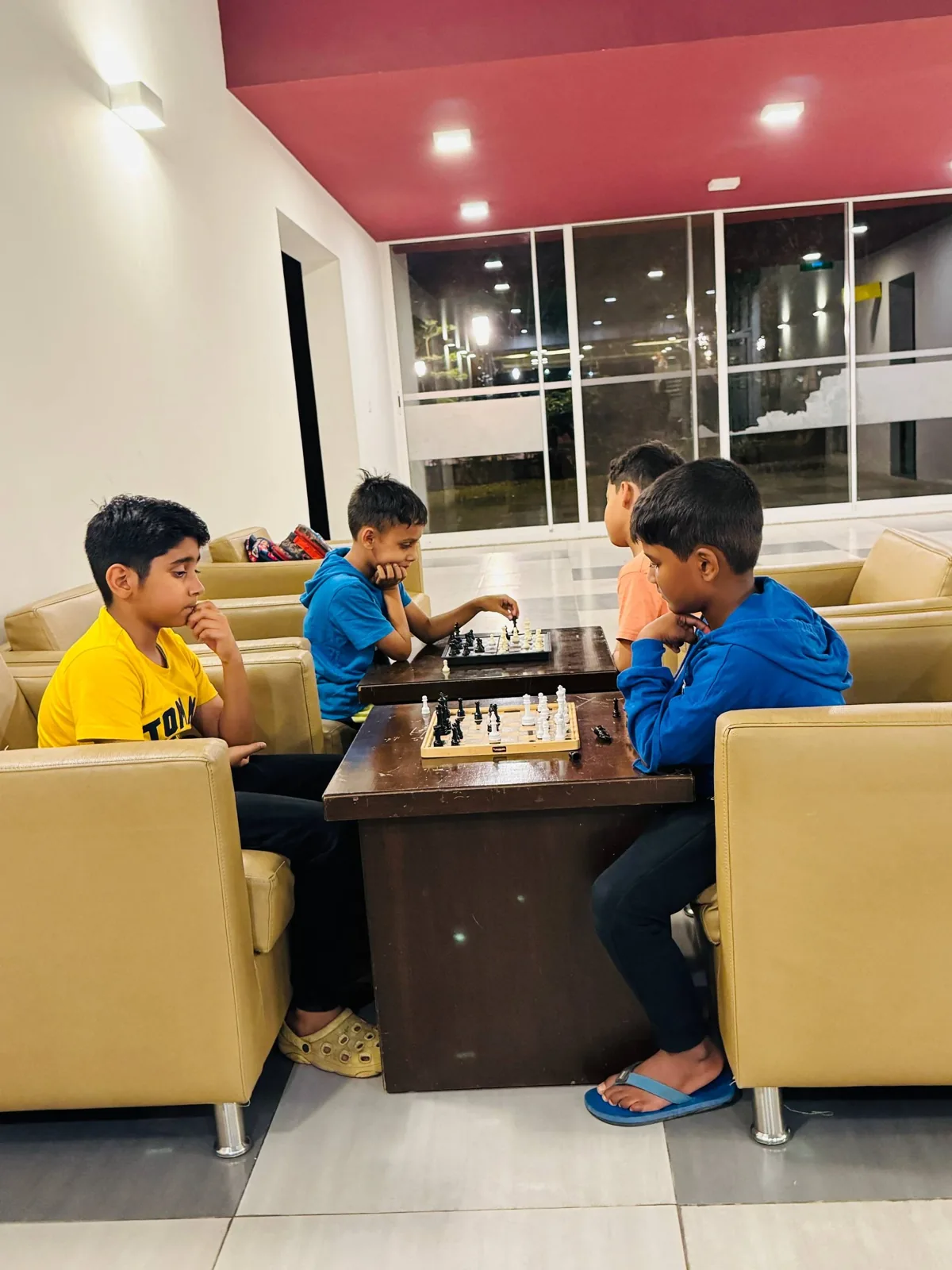 Classroom chess lesson with instructor and students at GKS Academy