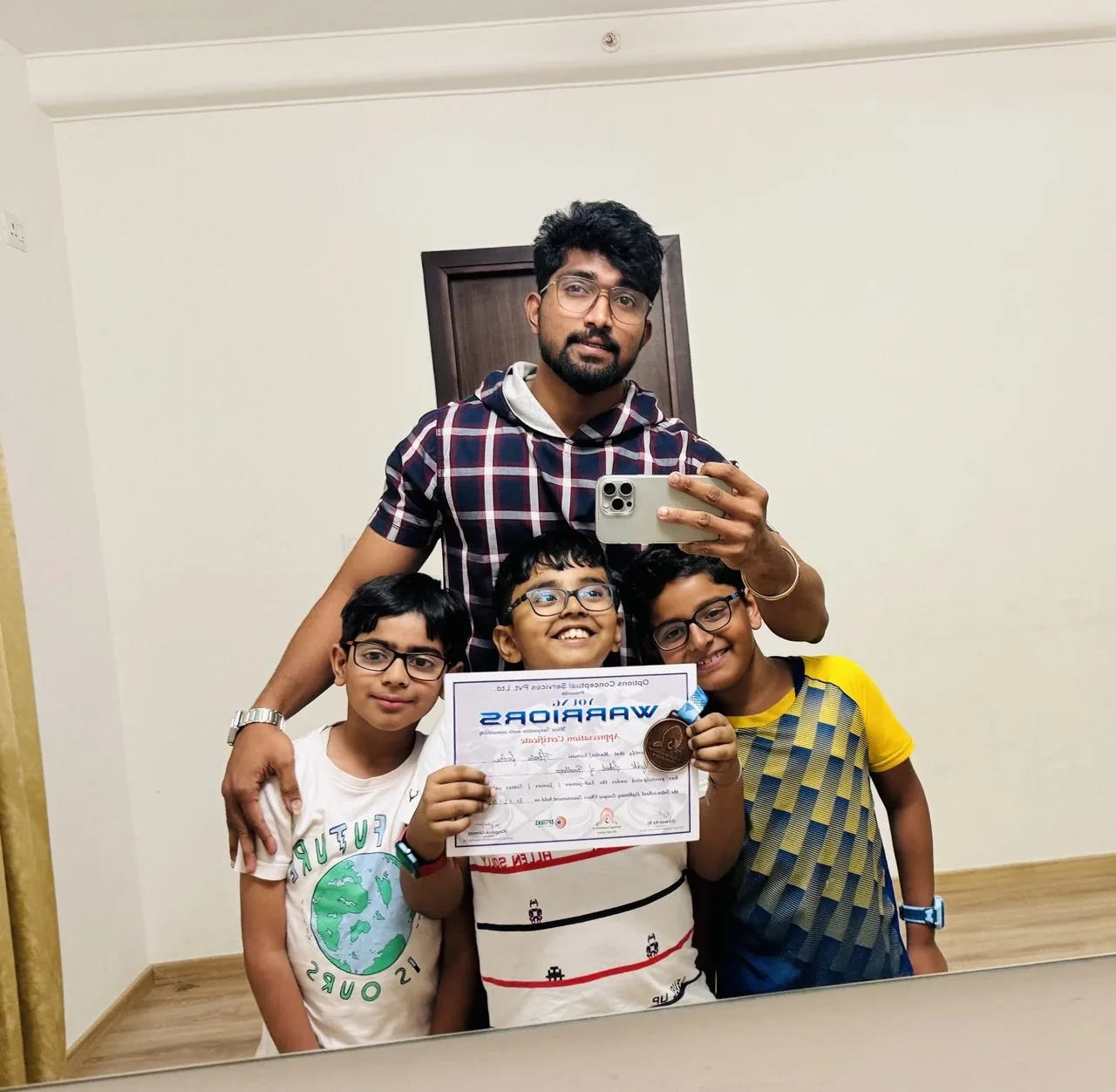 Chess instructor awarding certificates to young students
